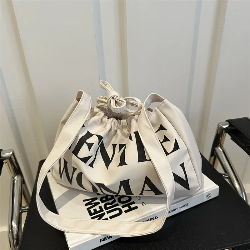 

Candy-colored dumpling bag Large capacity letter messenger bag Slack drawstring One shoulder armpit bag