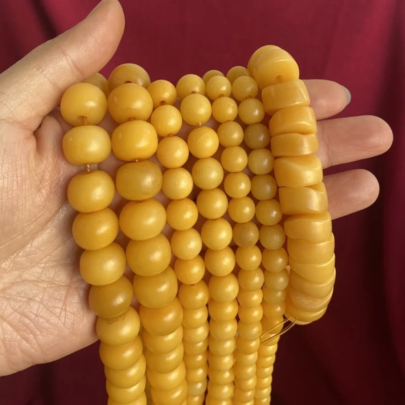 , cow bone, set of 108 Buddhist beads paired with a neck and chicken fat yellow plain bead