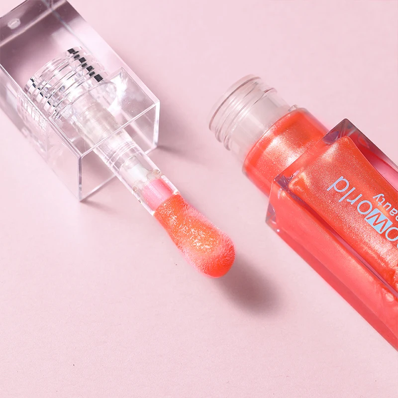 Orangerot feuchtigkeitsspendender Lipgloss, glänzender öliger Lipgloss, natürliches Lippenaufhellungsprodukt, zur Verschönerung der Lippen.