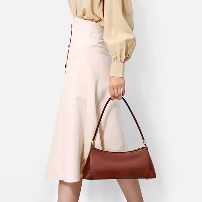 

2025 New Year and Summer Fashion Retro Real Leather Handbag Women's Multifunction Korean Style Solid Clothing Clutch Stick Pad B