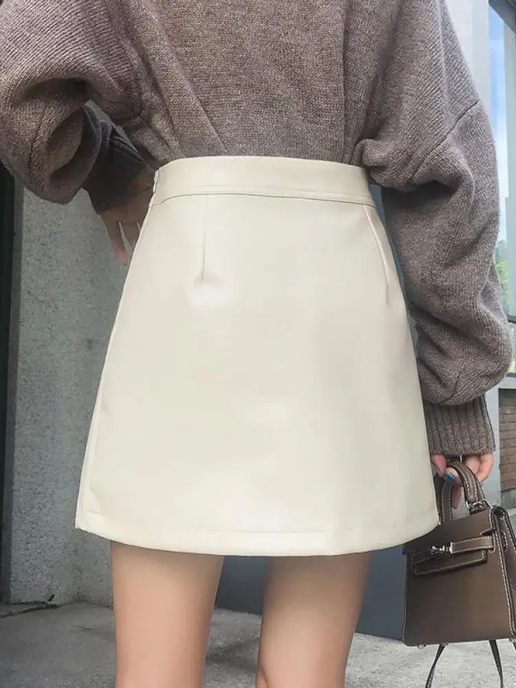 Koreańska Moda Damska Czarna Skórzana Elegancka Seksowna Klubowa Krótka Spódniczka na Zamek Jesień Zima Beżowa Spódniczka Mini w Kształcie Litery A z Wysokim Stanem Popularna