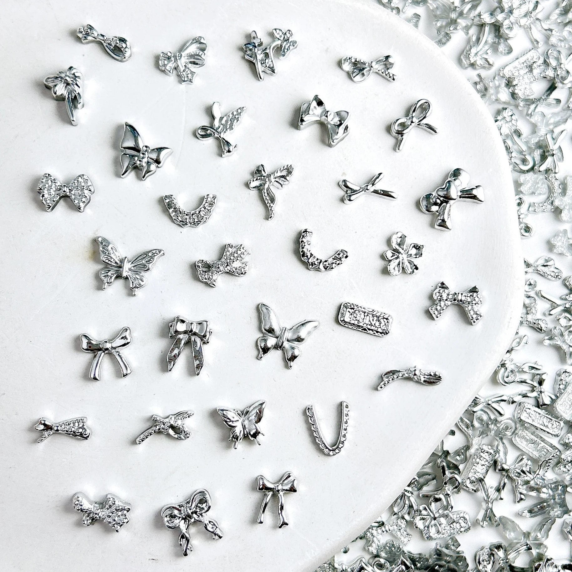 60PCS Multiple Style Silver Butterfly Bows Nail Art Decorations 3D Irregular Bowknots Ties Lace Flower Mixed Nail Charms for DIY