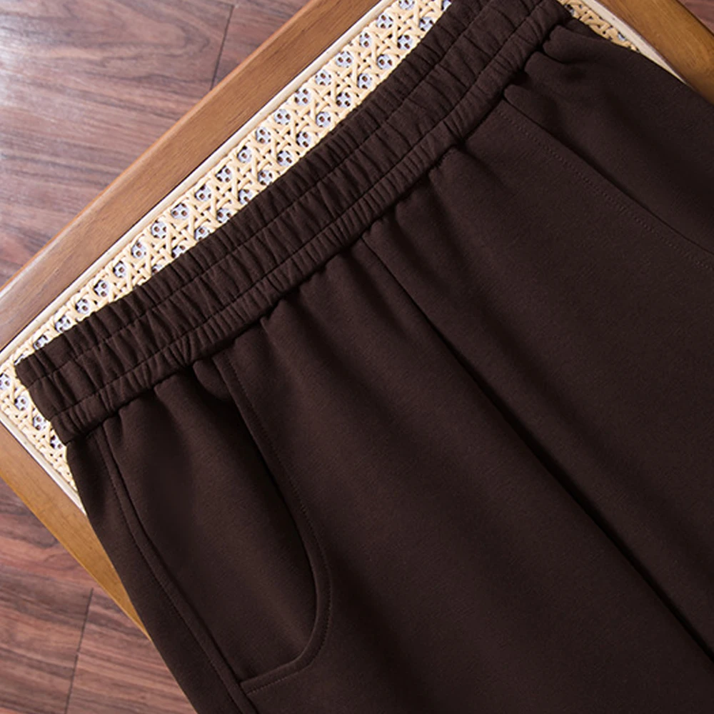 النمط الأوروبي السراويل الموز الأحمر النبيذ، المرأة الربيع والخريف الموضة الراقية الجديدة، بالإضافة إلى حجم السراويل سميكة واسعة الساق المنجل