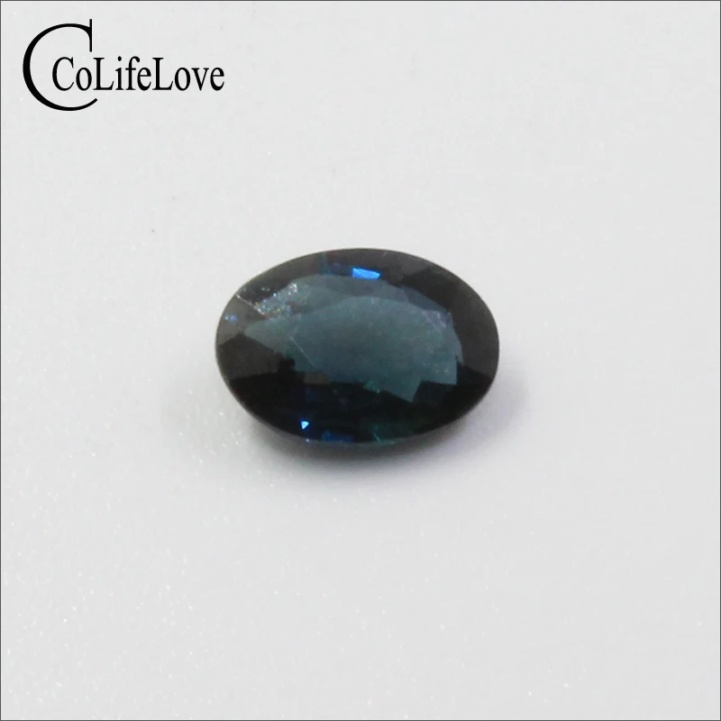 

Chinese Midnight Blue Sapphire Loose Gemstone 0.7ct 5mm * 7mm Real Natural Sappire Gemstone for Gold Jewelry Maker