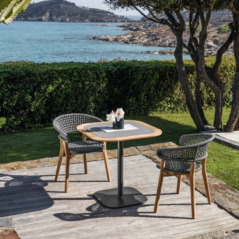 

Outdoor rattan table and chair hotel homestay garden Internet celebrity teak table and chair courtyard balcony leisure rattan