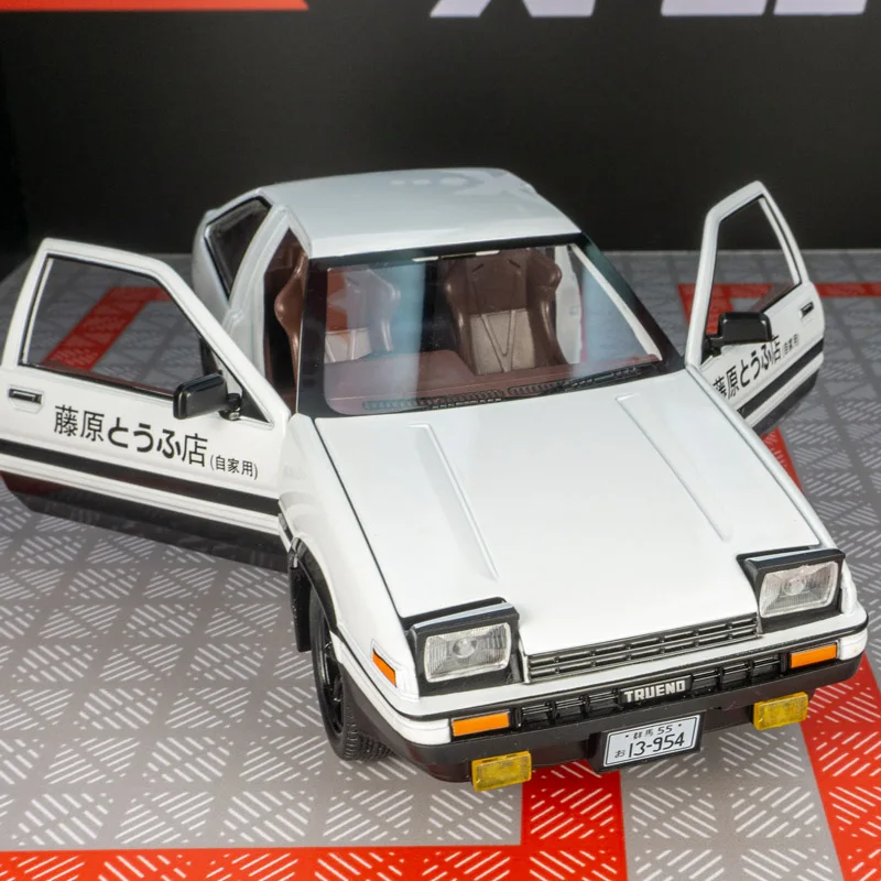 

Модель автомобиля Toyota AE86 из сплава, масштаб 1:24, с открывающимися дверями, передним капотом и багажником, богатая детализация, высокое качество изготовления.