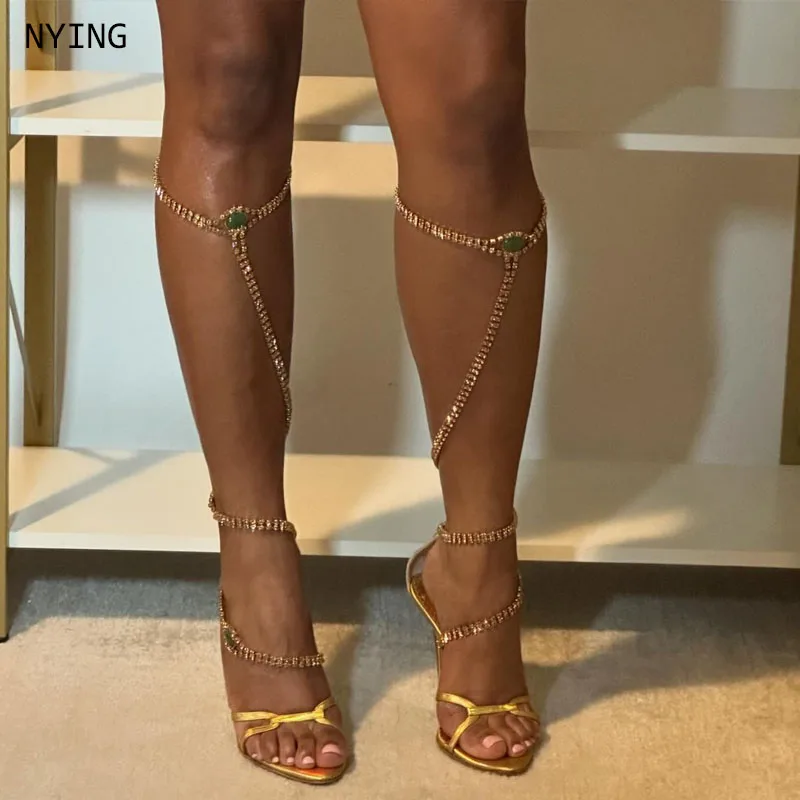 

2025 Women Summer Metal leather chain Cross-tied Thin heels Pointed toe Metal buckle Super high heel Open toe sandals 44