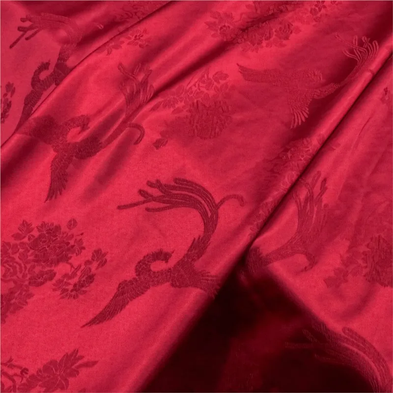 

A new Chinese-style cheongsam fabric with bright red jacquard silk stretch satin and crepe