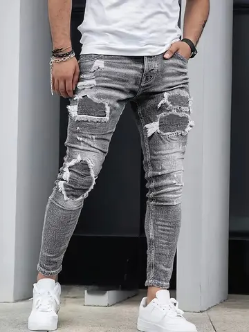 Men's trendy ripped skinny jeans, gray-white washed vintage look, unique worn-out design, fashionable street style.