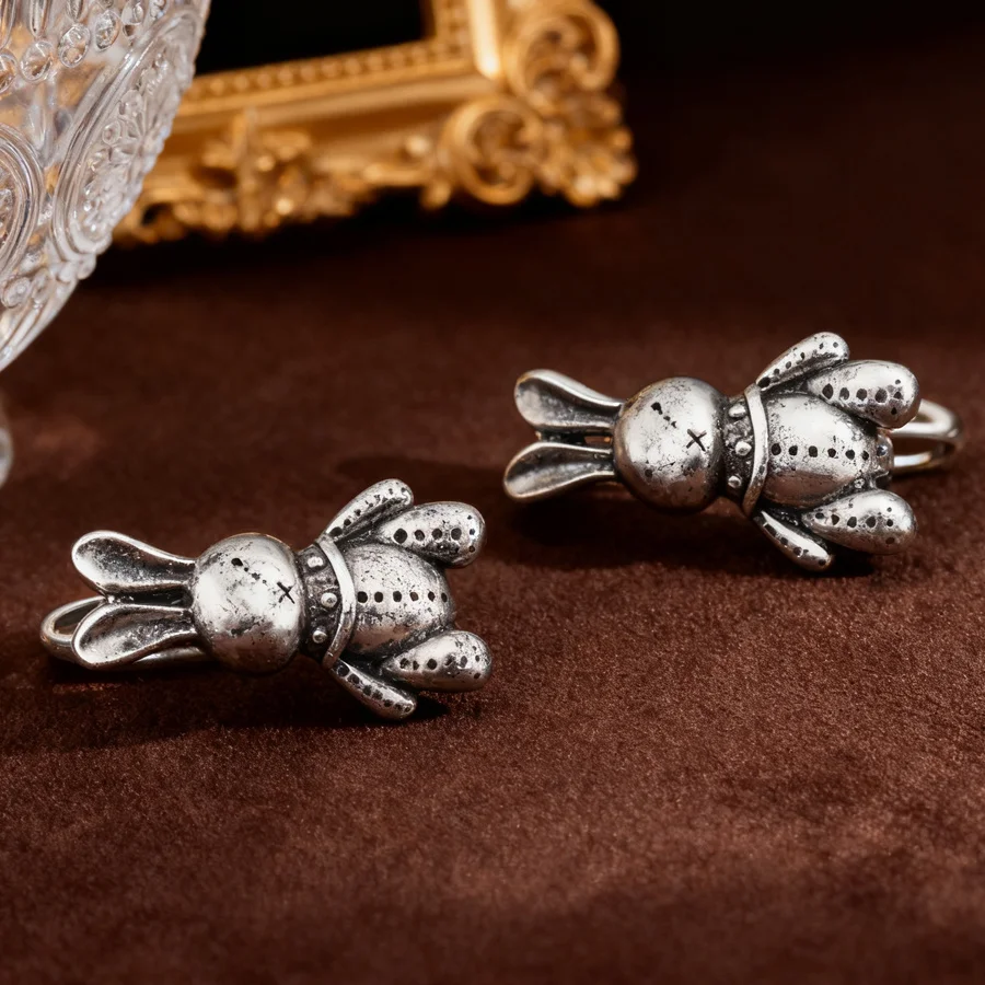

High quality anti allergic retro style silvery toned mechanical rabbit earrings, paired with personalized trendy accessories for daily wear, are a unique gift for women on birthdays.