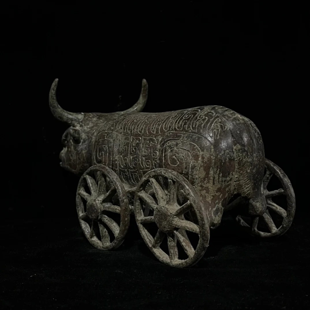 Old bronze red rust green ox cart