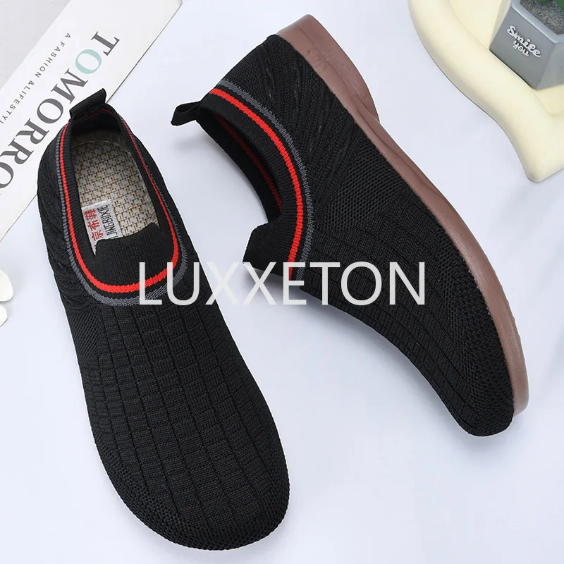 Women Mesh Flat Shoes Spring New Fashion Breathable Knitted Slip on Women Non Slip Walking Tennis Soft Soled Casual Sports Shoes