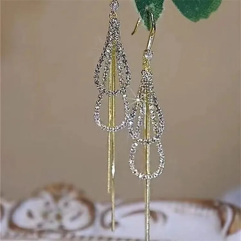 Elegante vergoldete Zirkonia-Schneeflocken-Ohrringe mit langen Quasten für Damen, Strass-Tropfenohrringe, Partygeschenk – Detail 1
