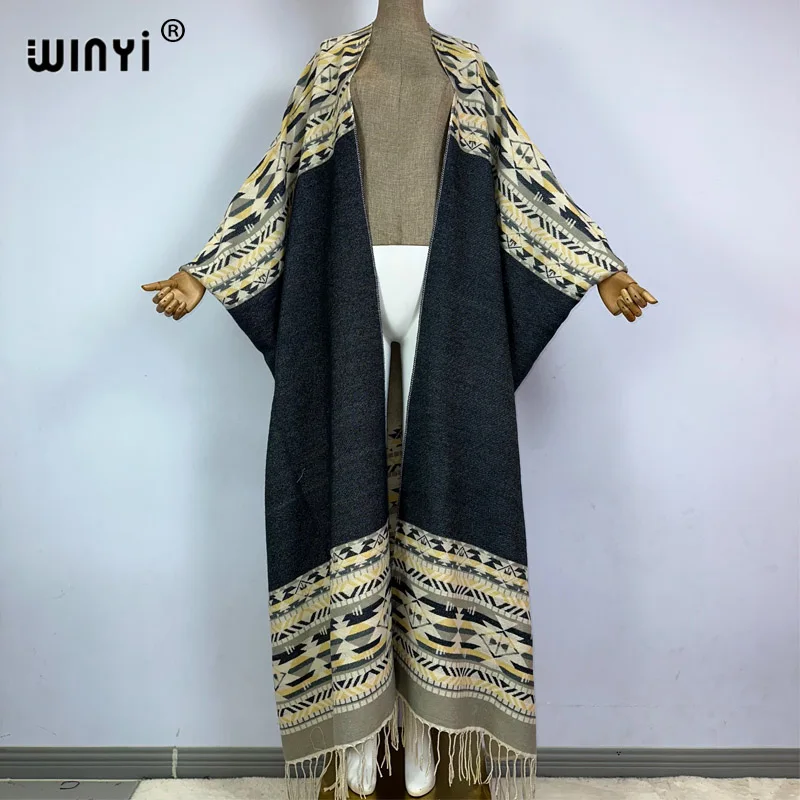 WINYI Winter new cloak Women High Quality poncho tassels Luxury Long Loose OverCoat Thick Warm Female long down coat jacket