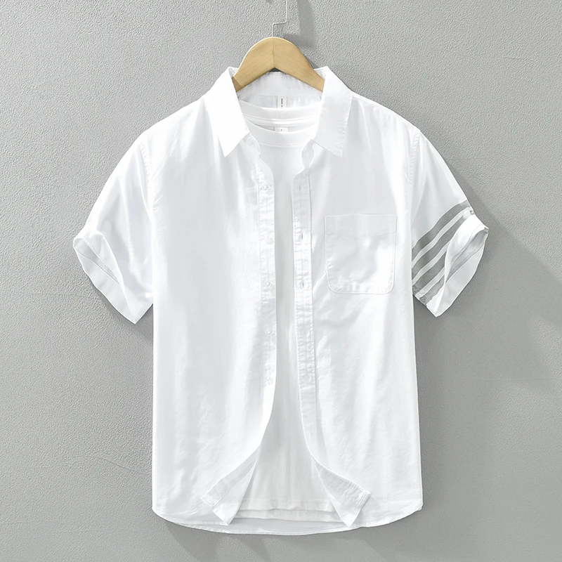 Camisa blanca de manga corta para hombre, camisas casuales con cuello vuelto, ropa de moda suelta de algodón