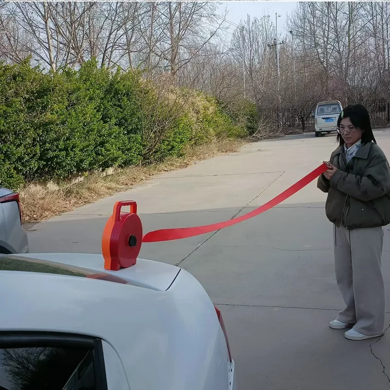Warning tape in a box, 50 meters long, red in color.