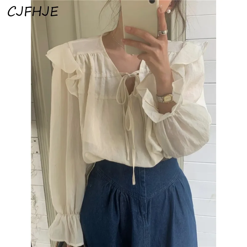 

CJFHJE Spring Korean Version Women's Ruffled Edge Sweet Lace Up Silk Shirt Fashion Design Flying Sleeve Women Casual Shirt Top