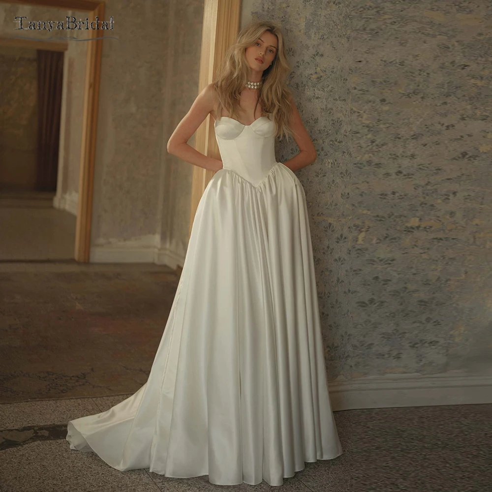 

Милые свадебные платья трапециевидной формы, объемные юбки, простые элегантные свадебные платья на шнуровке сзади DW1056