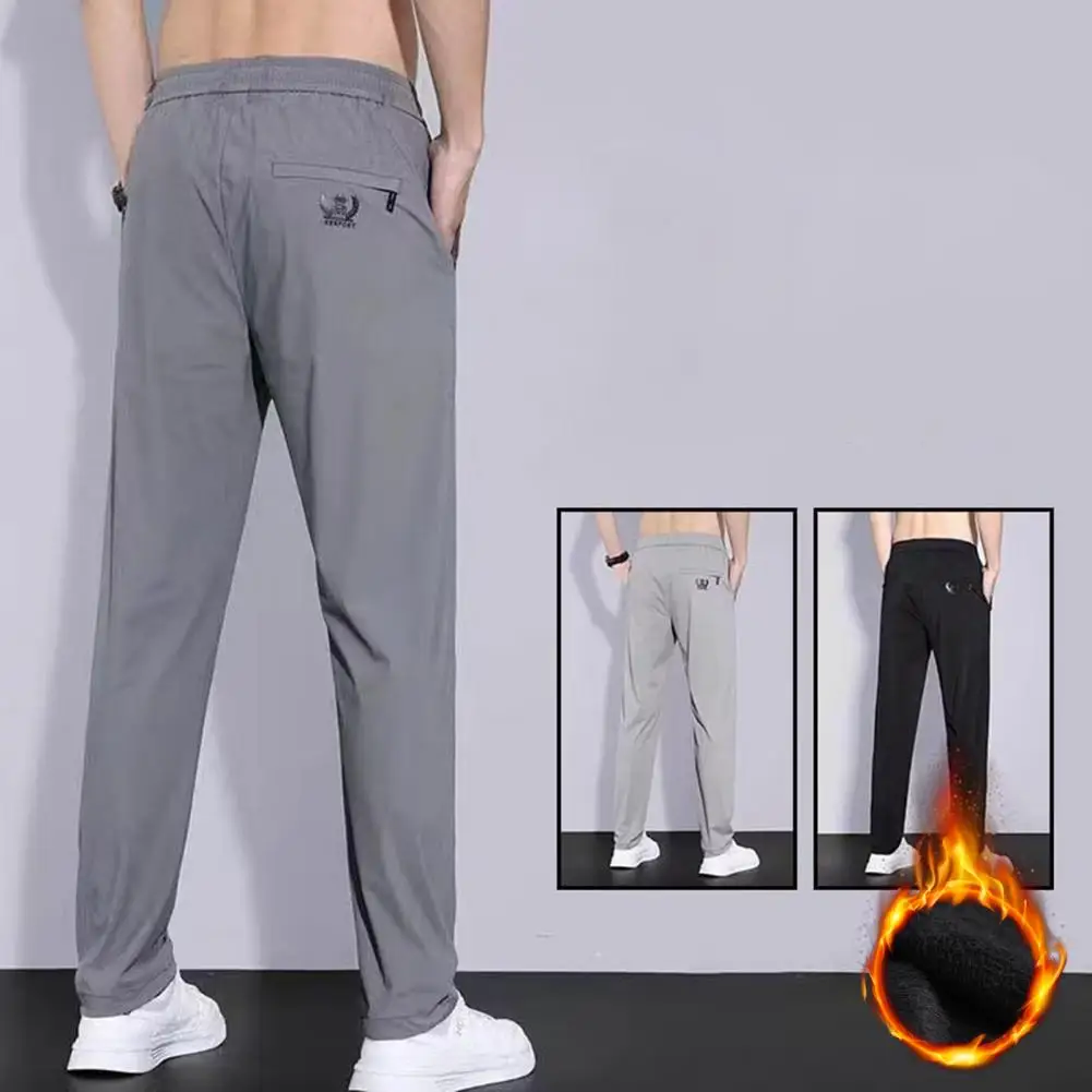 Pantaloni della tuta autunno e inverno da uomo elastico in vita pantaloni invernali da lavoro in peluche di grandi dimensioni pantaloni da Jogging