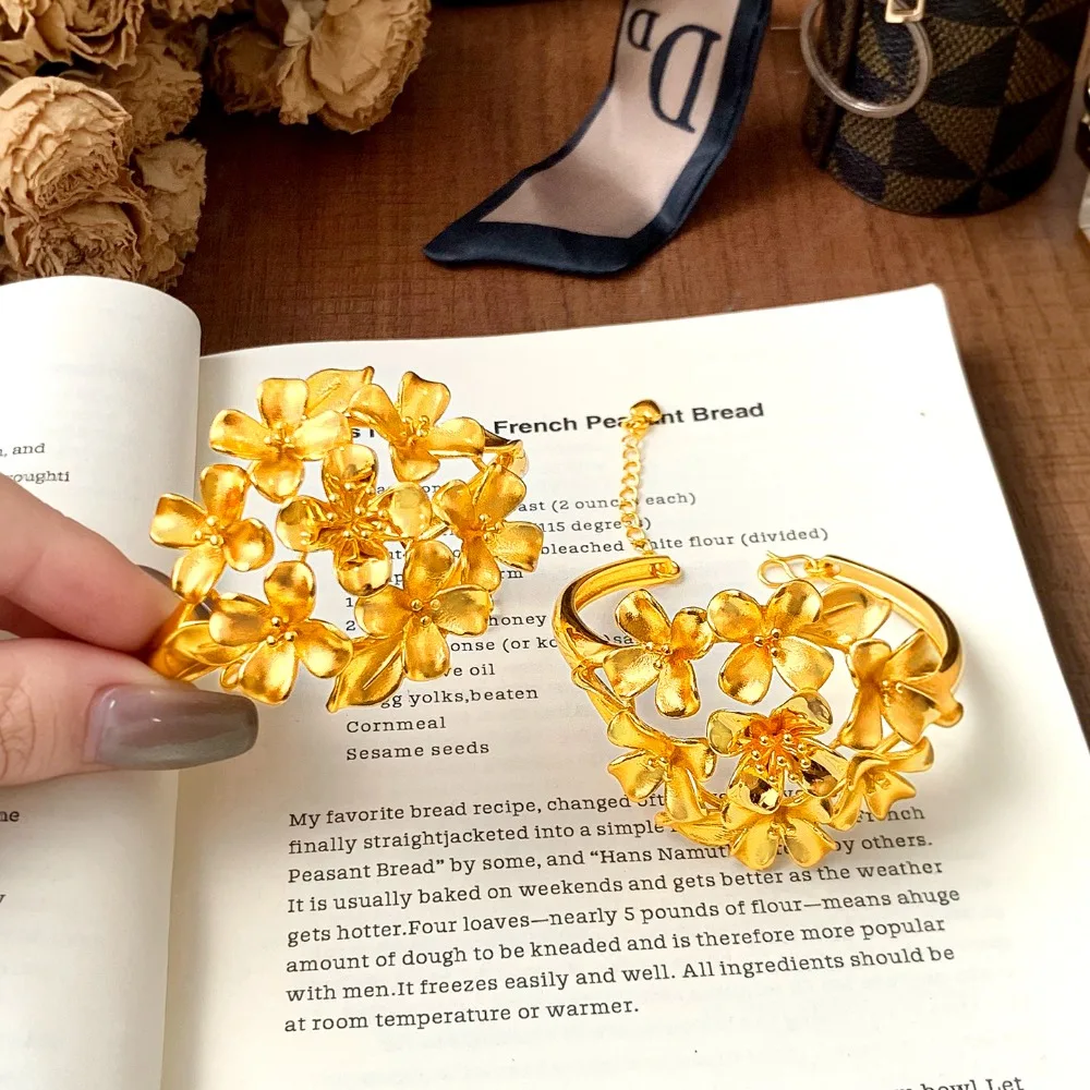 Three-dimensional bloated flower bracelet fashion simple hollow bracelet female models 9999gold