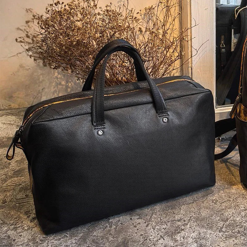 Cowhide Soft Black Leather Men simple travel bag large-capacity first layer women business trip luggage bag portable bags