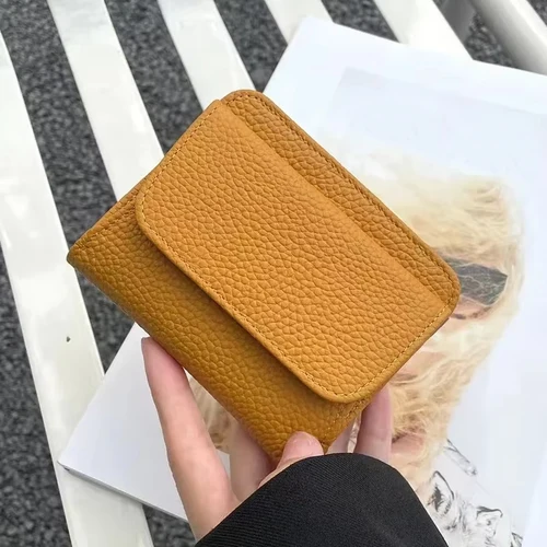 Imagen 1 del producto Cartera de cuero genuino para mujer, monedero plegable simple y pequeño, bolso multifuncional para monedas, ultra nuevo 2026