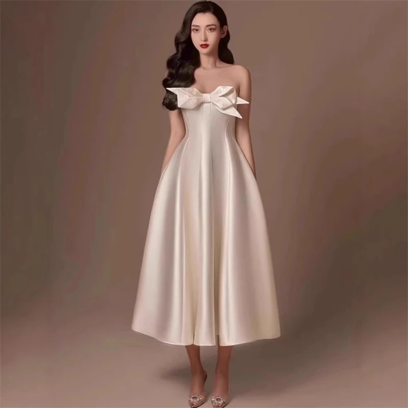 فستان ستان بحزام على شكل فيونكة ثلاثي الأبعاد بدون أكمام عند الصدر وسحاب عالي الخصر أنيق لحفلات الزفاف والسهرات للنساء