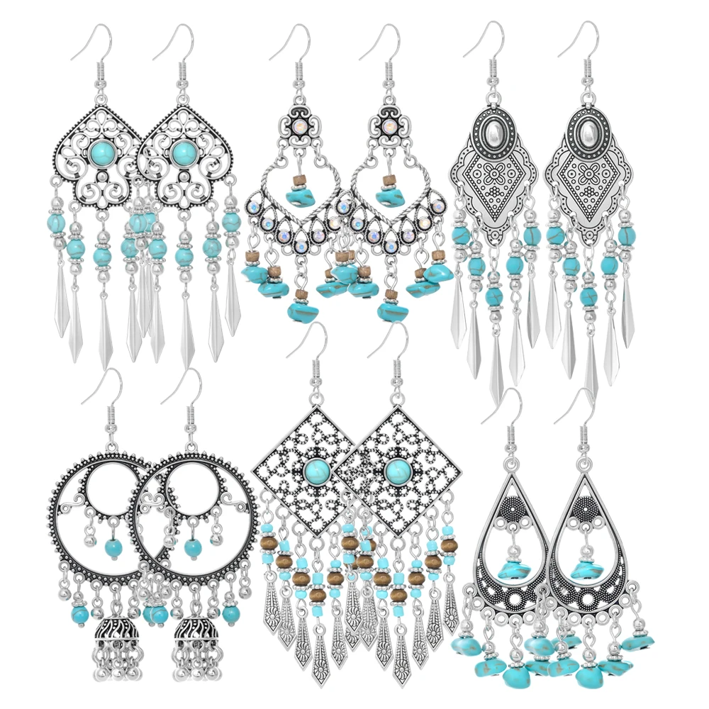 Western-style Bohemian long turquoise drop earrings—versatile silver openwork tassel earrings for women, perfect for vacations.