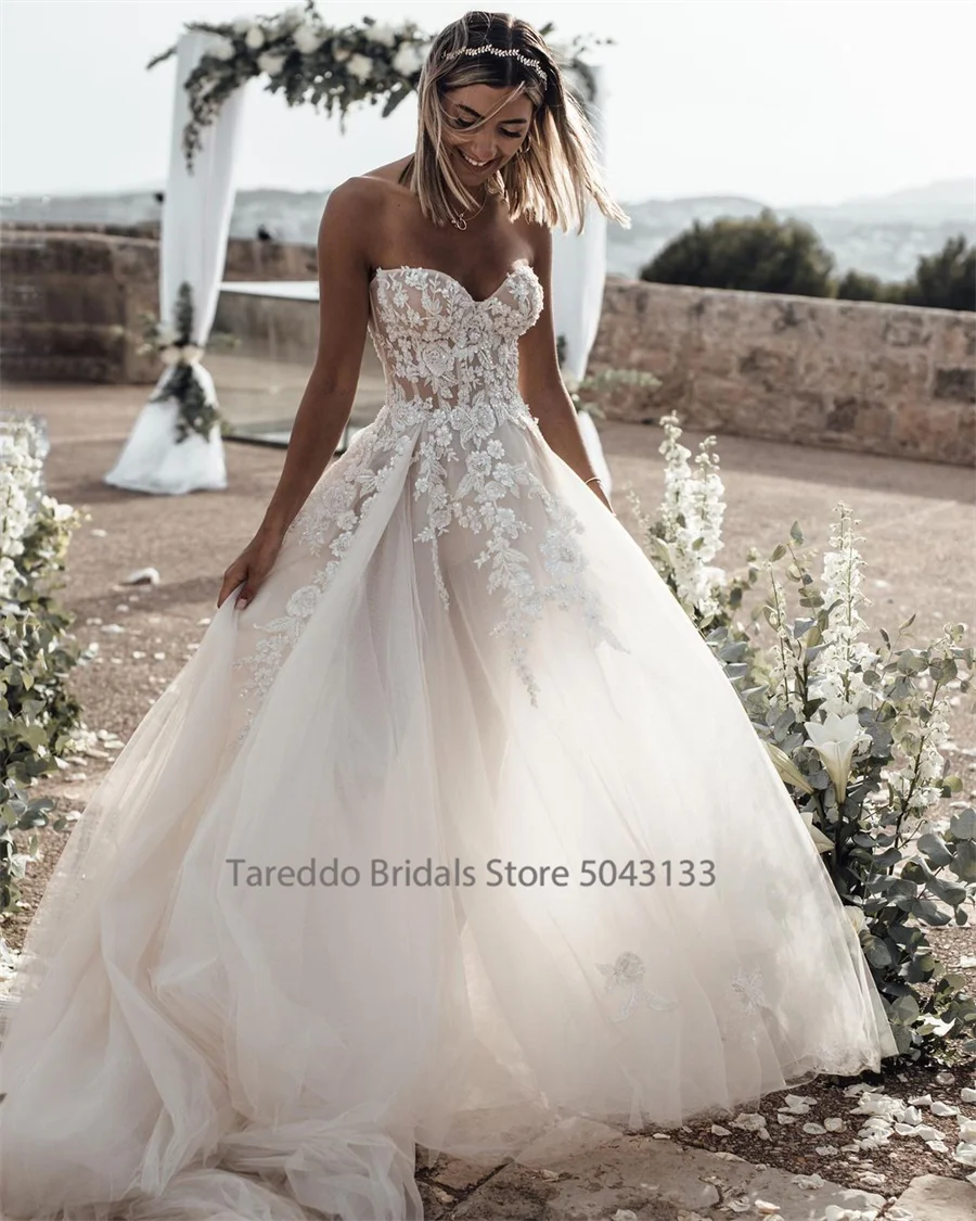 Customized Breathtaking Strapless Wedding Dress Featuring Stunning Crystals Lace Appliques and Flowy Silhouette Bridal Dress