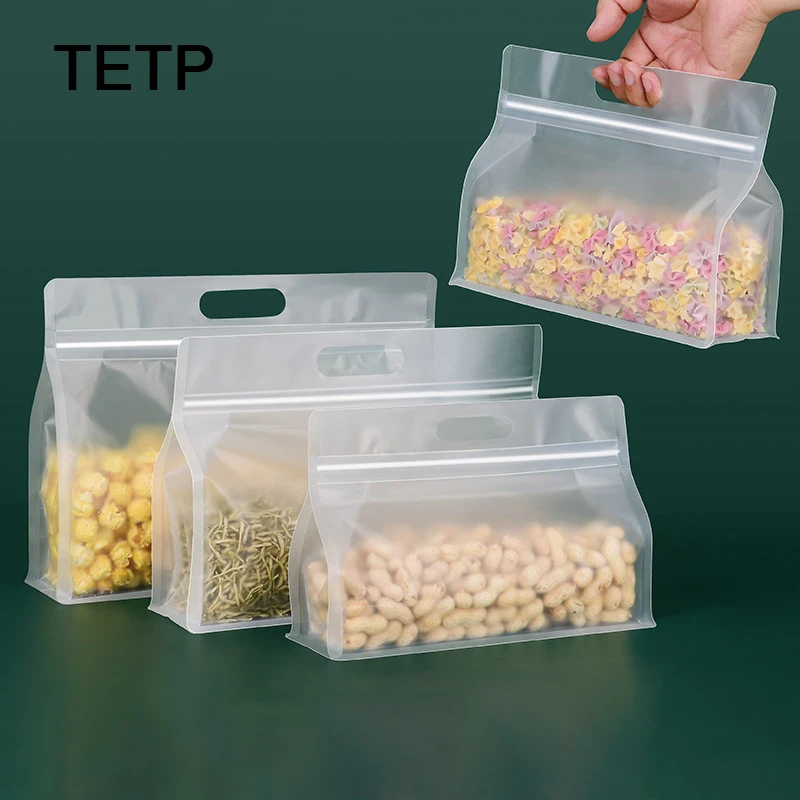 TETP-bolsas transparentes esmeriladas con asa para alimentos, 50 piezas, para el hogar, fideos, galletas, dulces, nueces, aperitivos, almacenamiento a prueba de polvo, venta al por mayor