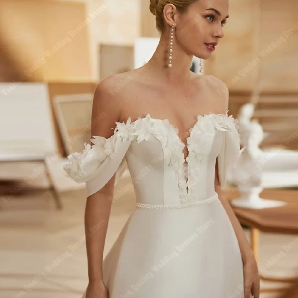 ลูกไม้ที่สวยงามพิมพ์ผู้หญิงชุดแต่งงานเซ็กซี่แขนกุดชุดเจ้าสาววินเทจส่องแสงรูปลอกออกแบบเดรส เดอ โนเวียที่กำหนดเอง