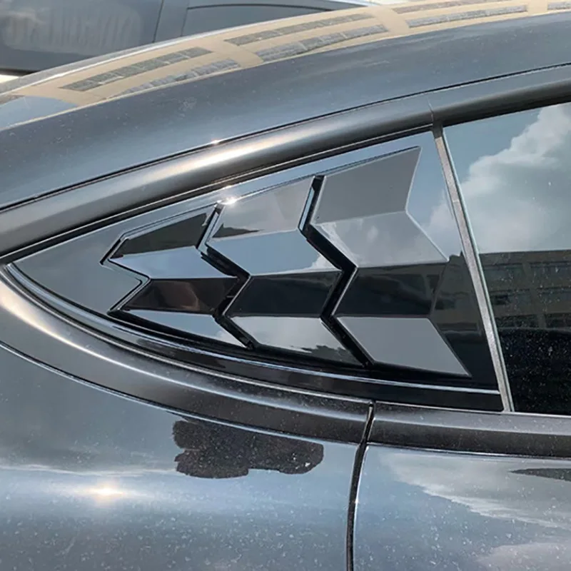 

Suitable for The rear triangular window louver air vent panel of Tesla 3 was modified with carbon fiber sporty decorative sticke