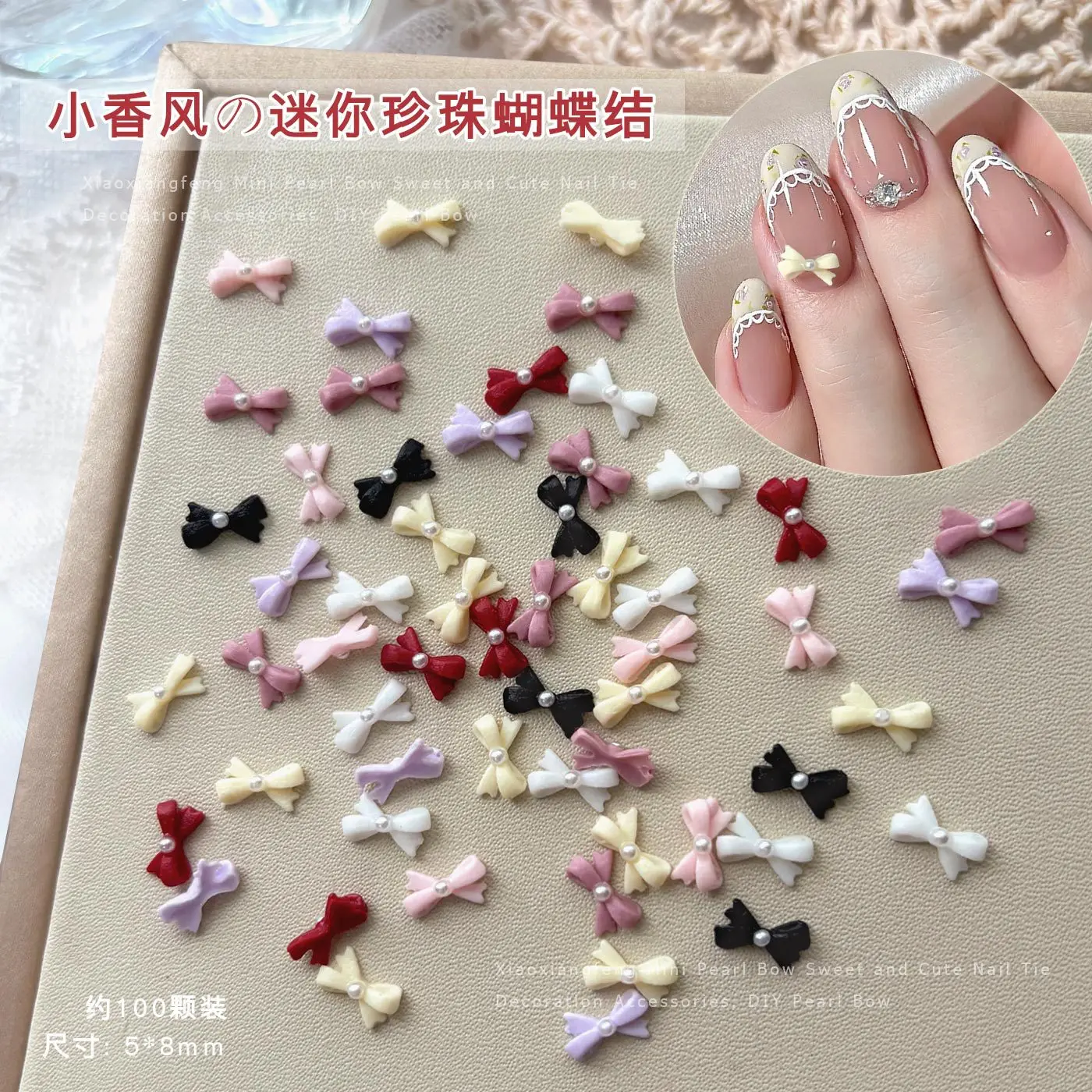

100pcs of bow-shaped nail art accessories with small pearls. These fashionable bow ties are perfect for decorating women's nails