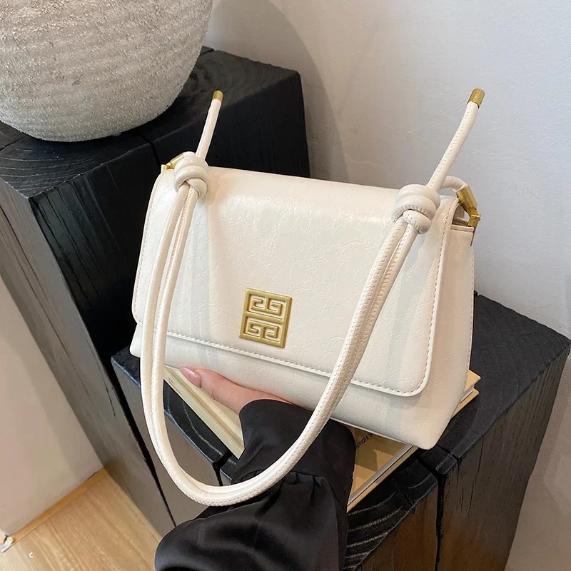 2026 العصرية الرجعية الكلاسيكية حقيبة مربعة صغيرة مصمم الباريسي الراقية الخفيفة الفاخرة قسط الجلود المرأة حقيبة كتف الموضة #4