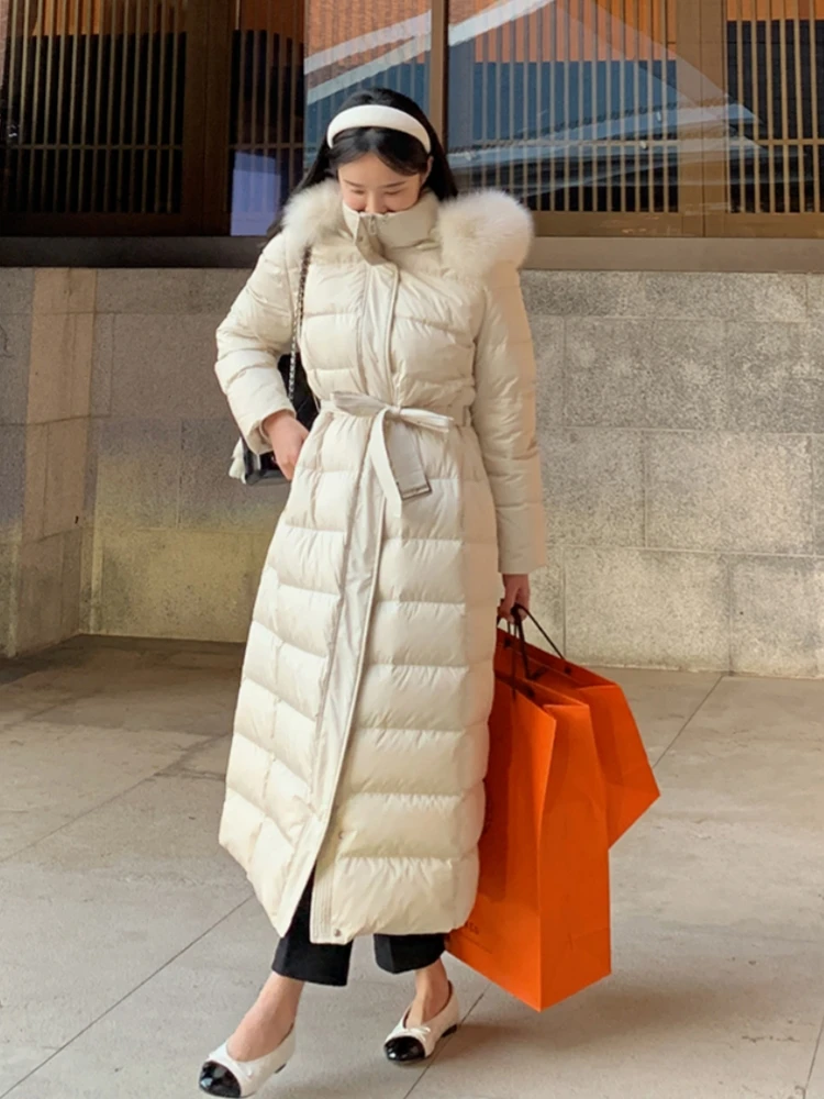 

Winter 2025 New Long Thiened Hooded Fur Collar down Jaet Women's Faion Korean Sle Warm Memory Fabric Nylon Coat