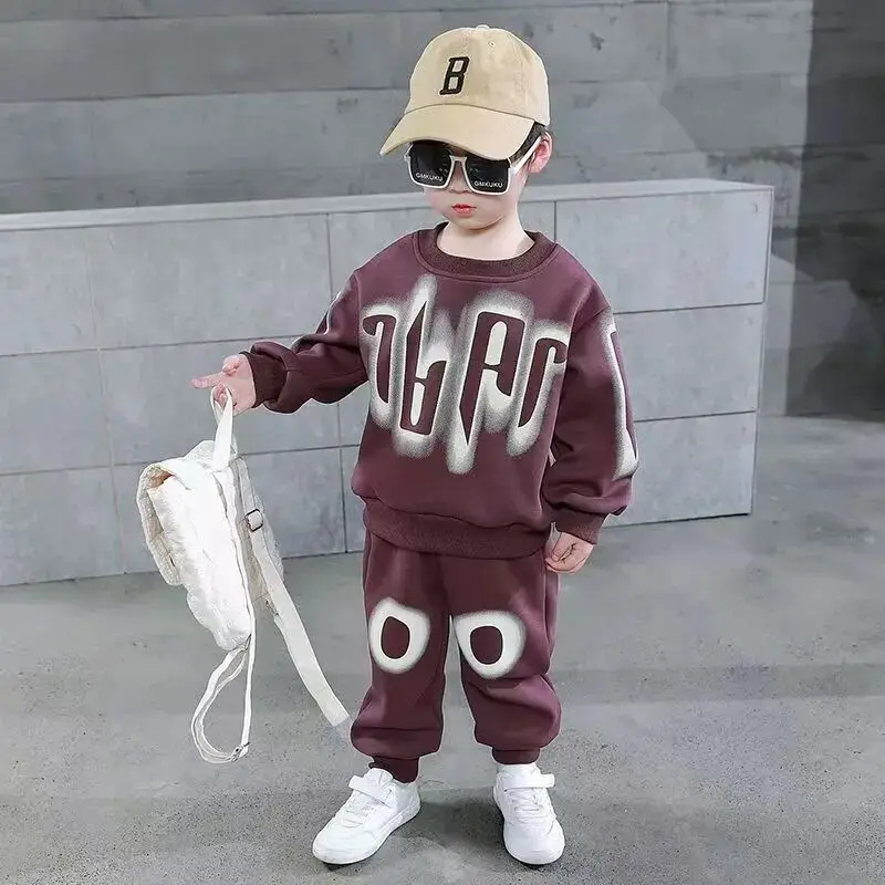 Wiosenny i jesienny zestaw odzieży dziecięcej 2025 Nowy luźny zestaw sportowy dla chłopców i dziewcząt Spodnie z kapturem Dwuczęściowy zestaw