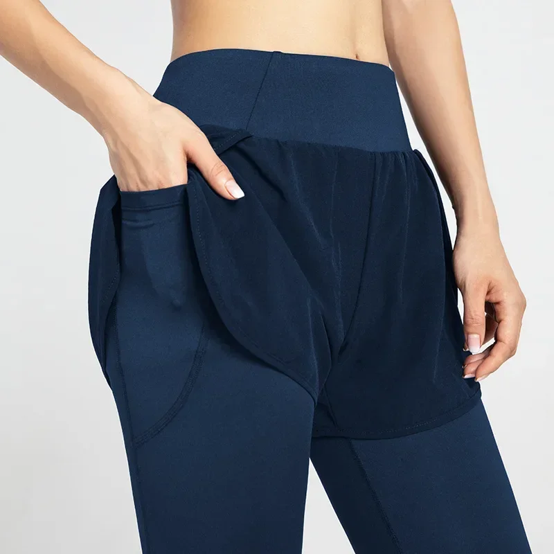 Pseudo-pantalones cortos deportivos de dos piezas para mujer, Shorts ajustados de cintura alta, elásticos, levantamiento de cadera, piernas pequeñas, Fitness, correr, pantalones de Yoga con bolsillo