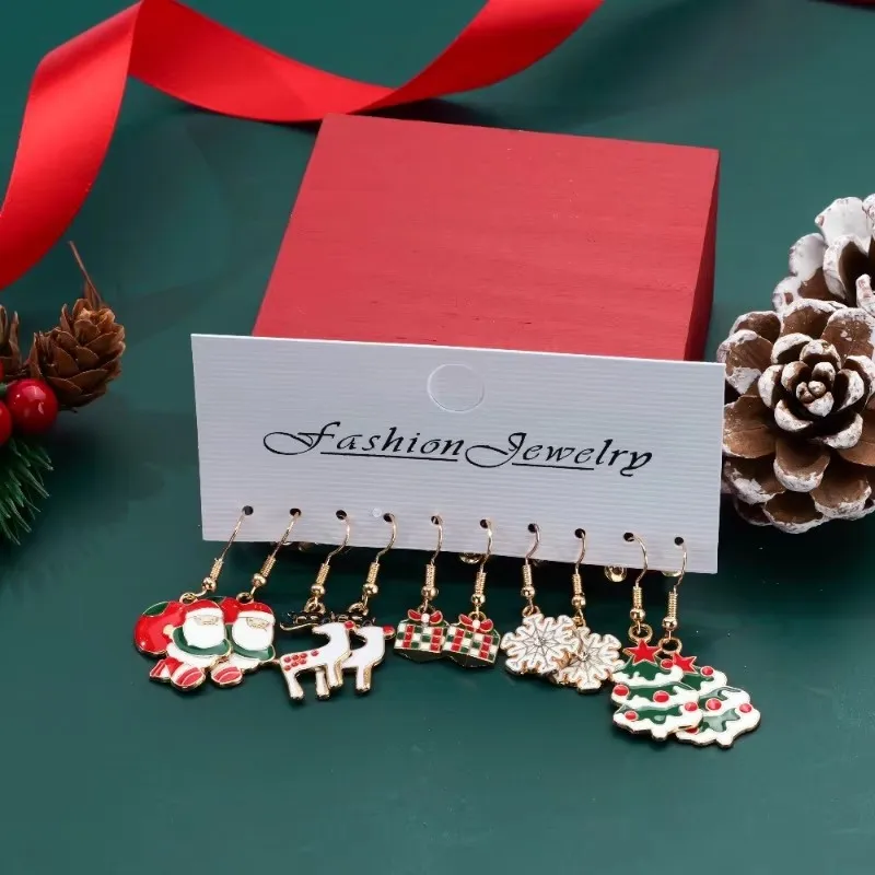 Conjunto de aretes navideños Diseño creativo Papá Noel Muñeco de nieve Copo de nieve Estrellas Pendientes y aretes de árbol de Navidad