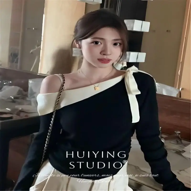 

Черные вязаные топы с открытыми плечами и внутренним нижним слоем, с наклонными плечами, женские элитные осенние новинки, новый стиль для женщин