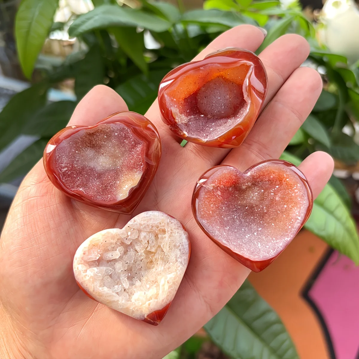 Heart-shaped Natural Red Crystal Cluster with Openwork Patterns and Cave Openings, Polished To A Glossy Finish.