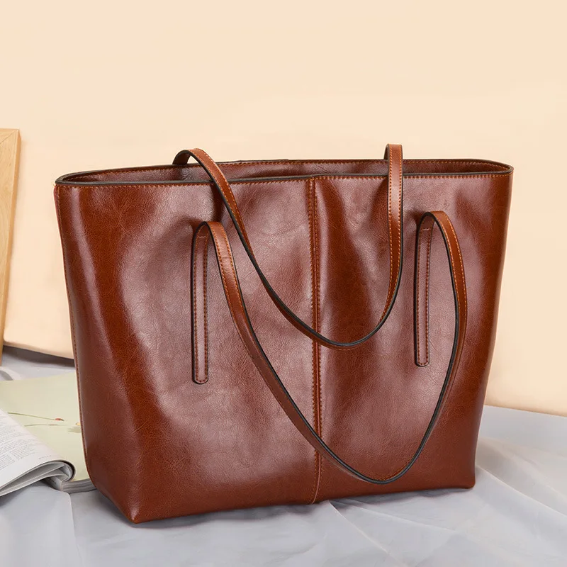 

New Women's Large Capacity Leather Tote Bag - Fashionable Single Shoulder Commuter Handbag, Cowhide Leather, Top-Handle Design