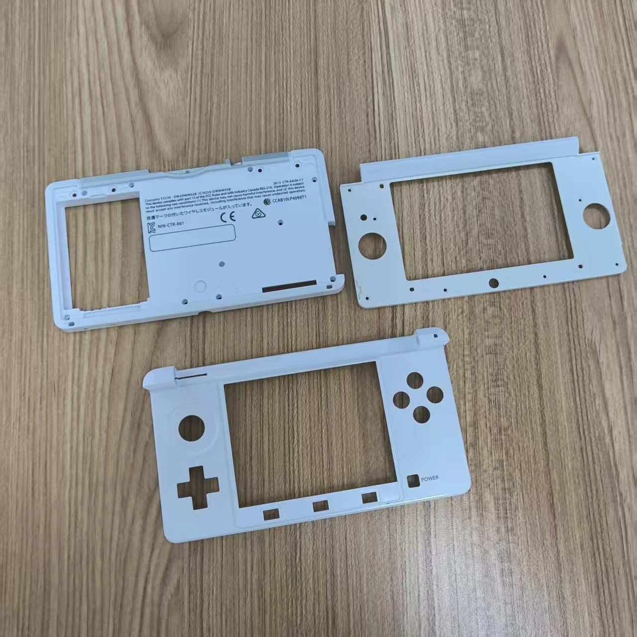 Scatola protettiva a conchiglia per copertura alloggiamento con cornice centrale colorata originale per console 3DS