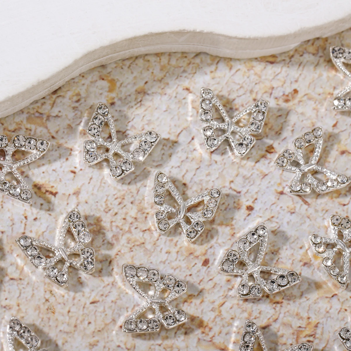 10 pcs/ bag Silver alloy butterfly nail rhinestone patch stereo hollow butterfly nail metal diamond, rhinestone nail accessories