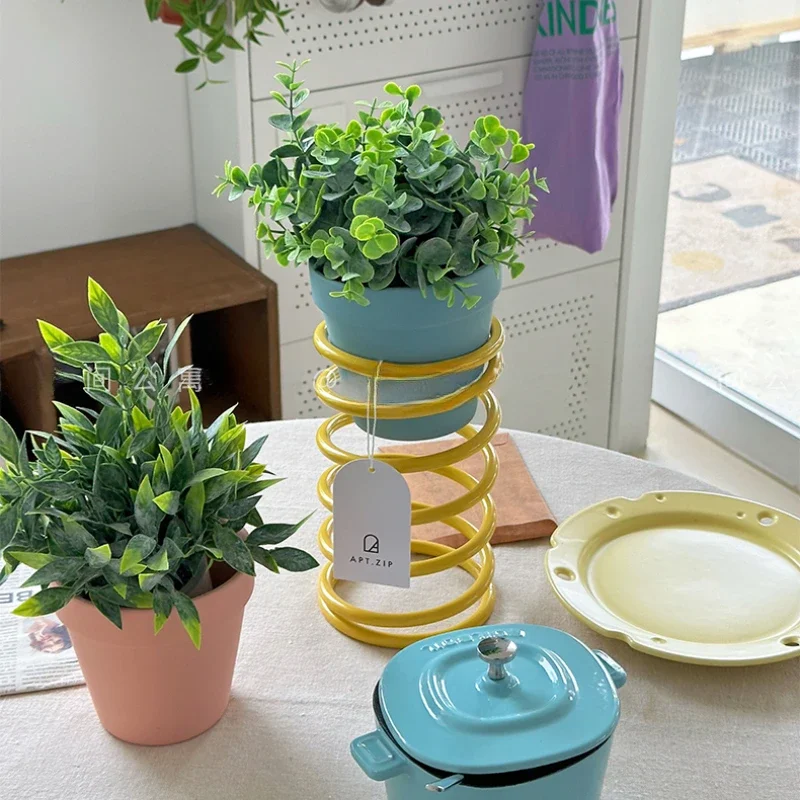 حامل زهور الربيع الإبداعي الحديث متعدد الألوان أواني النباتات البستنة الداخلية تنفس تصميم بسيط حامل النباتات المرتفع