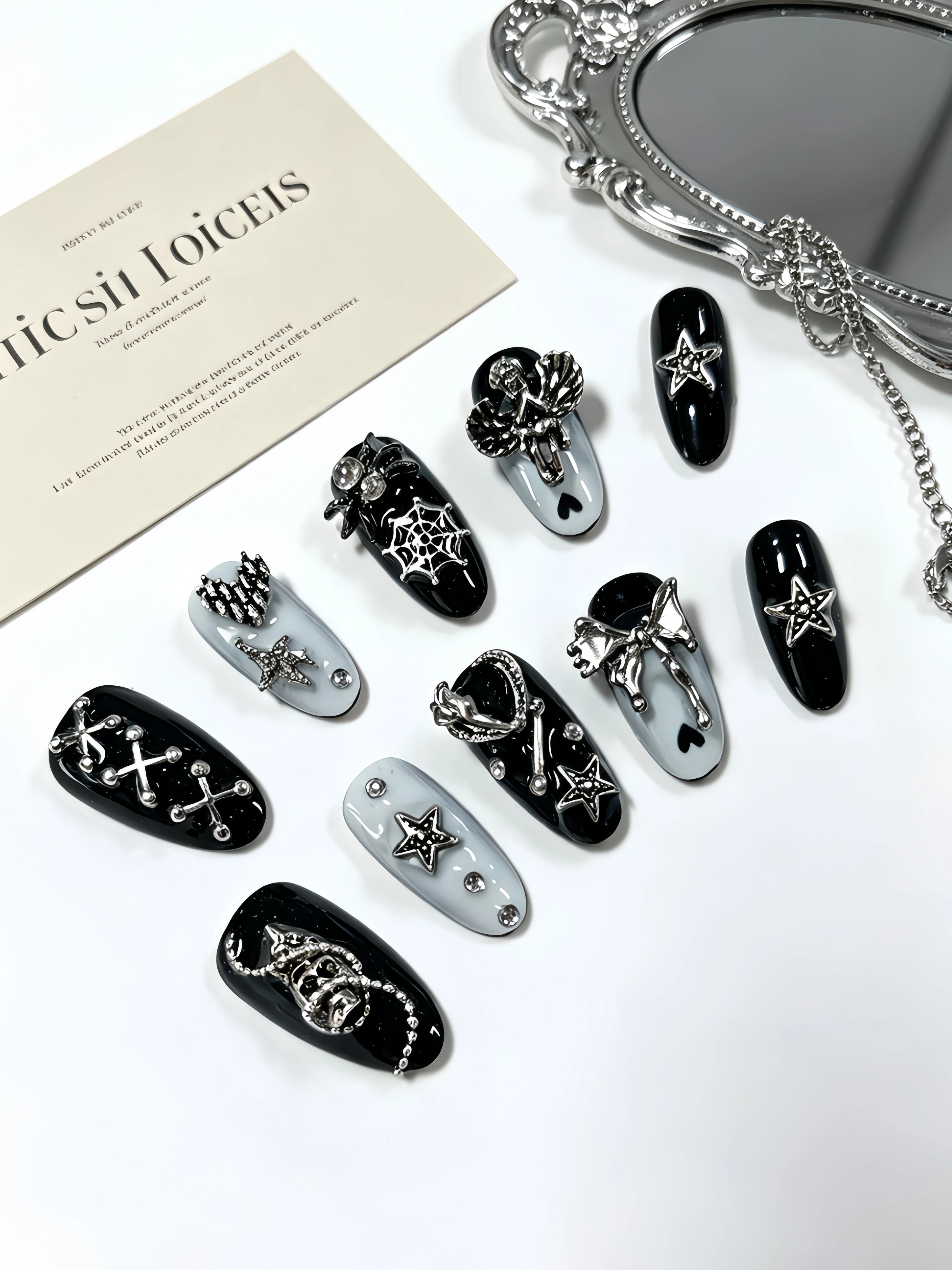 10 Black Almond-Shaped Press-On Nails, Black and White Color Scheme with Silver Chain Heart Ornaments, Angel Stars, Rhinestones, and Bow Embellishments, Y2K Dark Style Nail Stickers, Suitable for Mature Women, Sweet and Cool Girls, Students, and Those with Unique Personalities, Fake Nails for Halloween, Music Festivals, Vacations, Dates, and Photo Shoots, Trendy Nail Art Designs, Includes One Jelly Glue and One Nail File