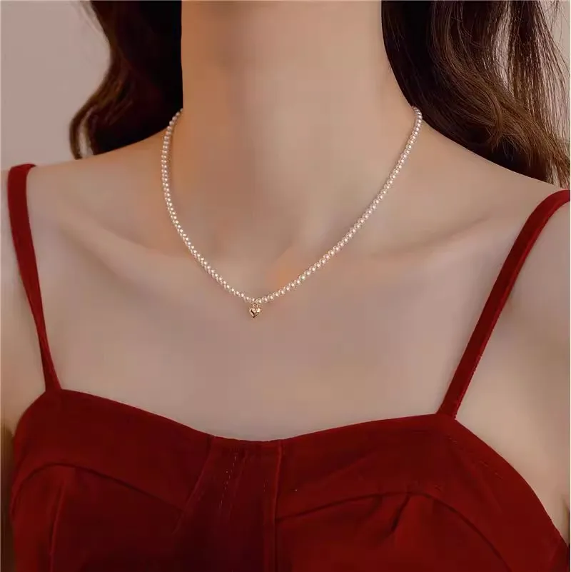 New Love Pearl Pendant Necklace Women's Light Luxury Temperament High-end Clavicle Chain Fashion Popular Niche Necklace