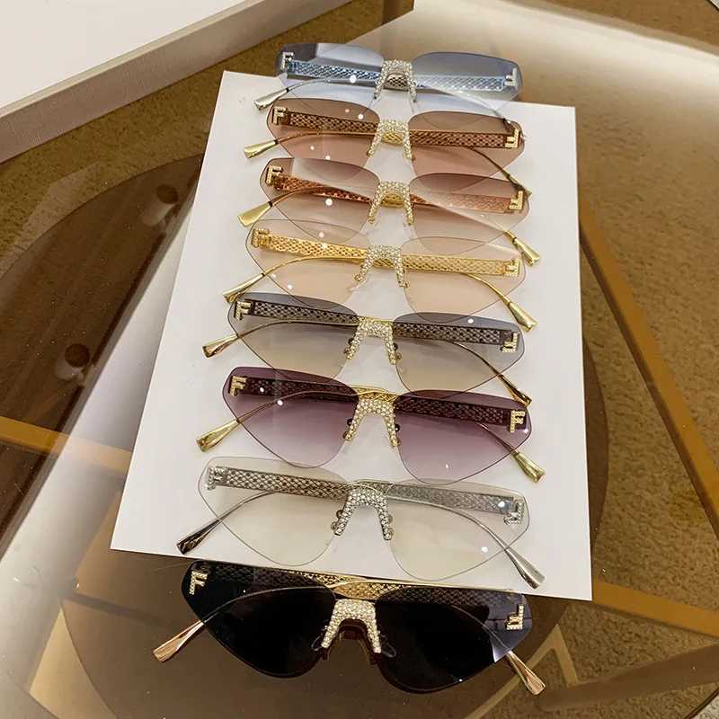 Frauen Sexy Cat Eye Randlose Strass Sonnenbrille Luxus Marke Designer Retro Punk Metall Sonnenbrille männer UV400 Fahren Gläser – Detail 1