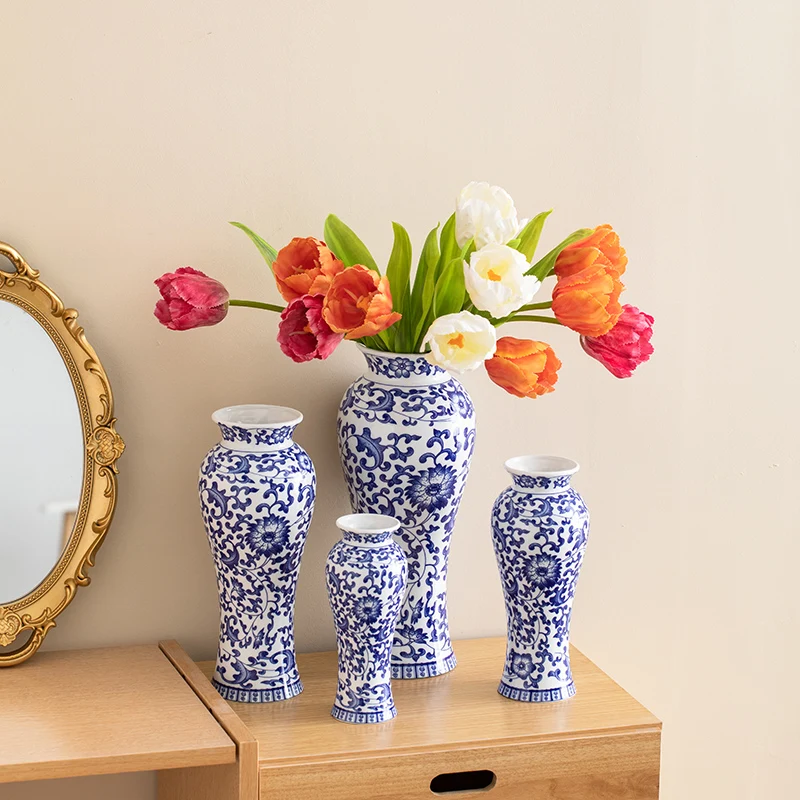 

Porcelain vase, blue and white porcelain, ancient dried flowers, fresh flowers, watered plants, decorative item