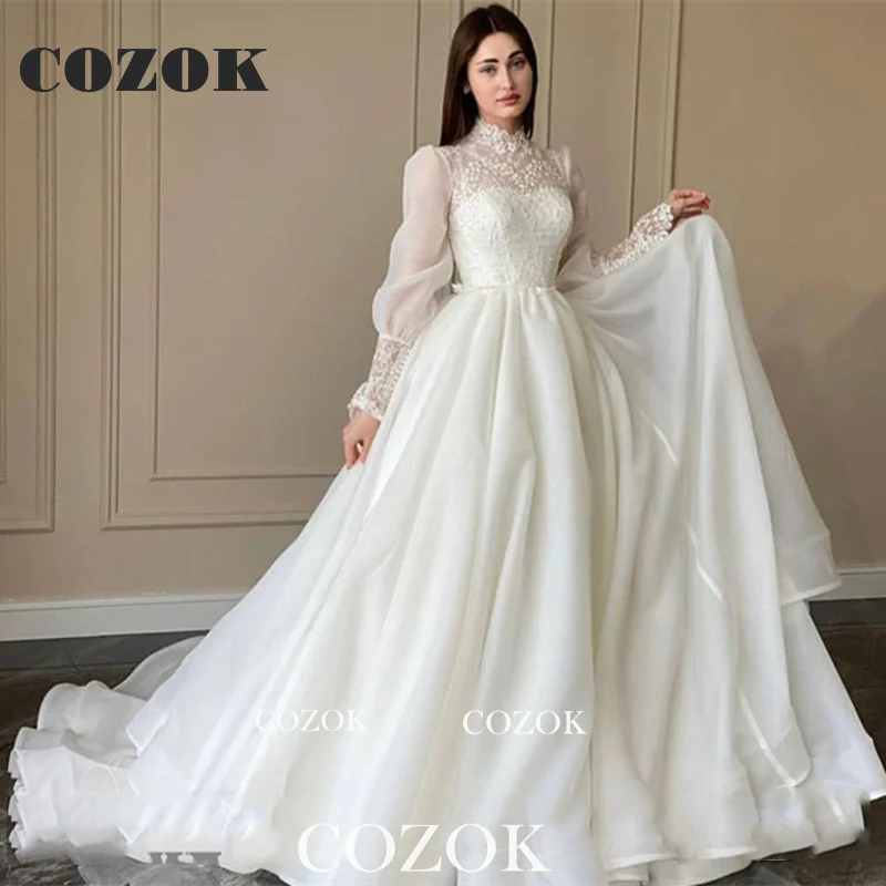 Modesto organza uma linha apliques vestido de casamento do laço puff mangas compridas alta pescoço vestidos de noiva robe de mariage personalizado tg001