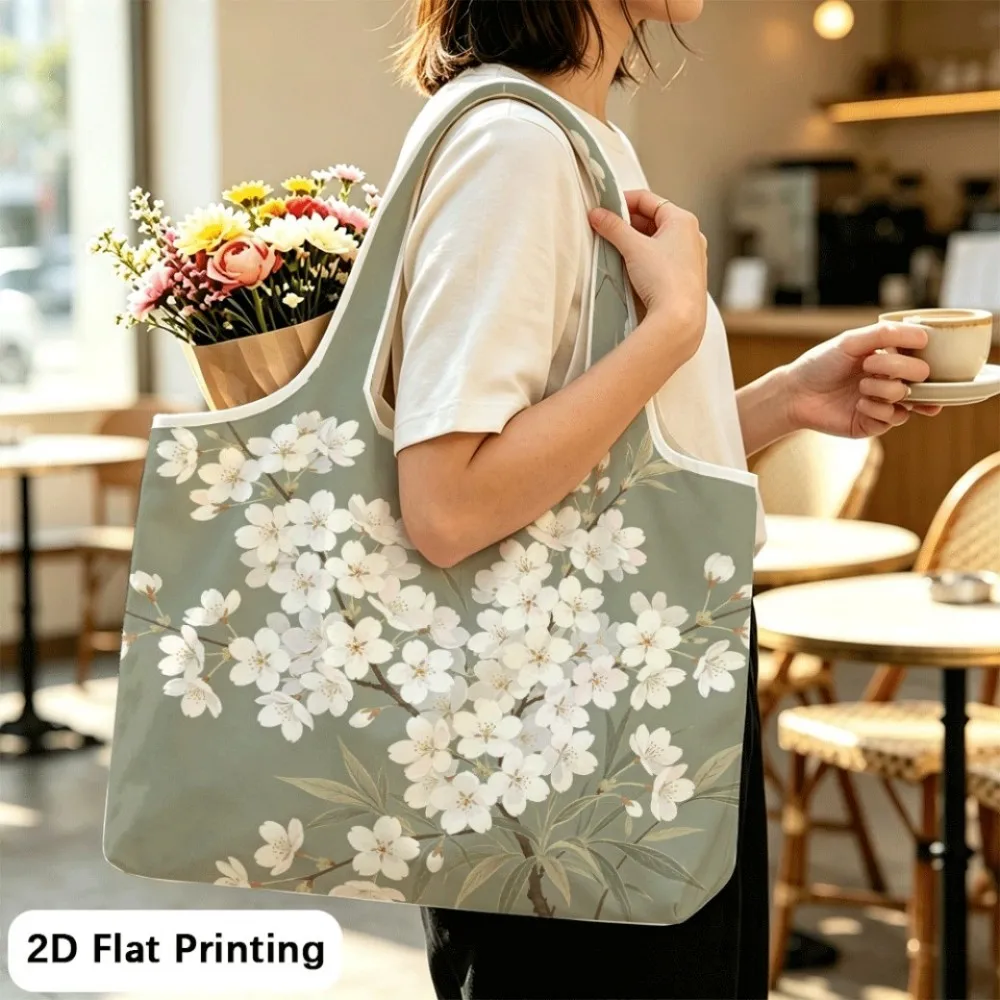 White cherry blooms on sage Large opening shoulder tote, foldable, easy to pack items.